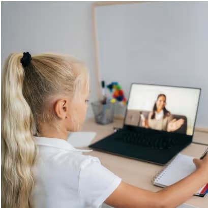 A student at a laptop during a video speech-therapy session